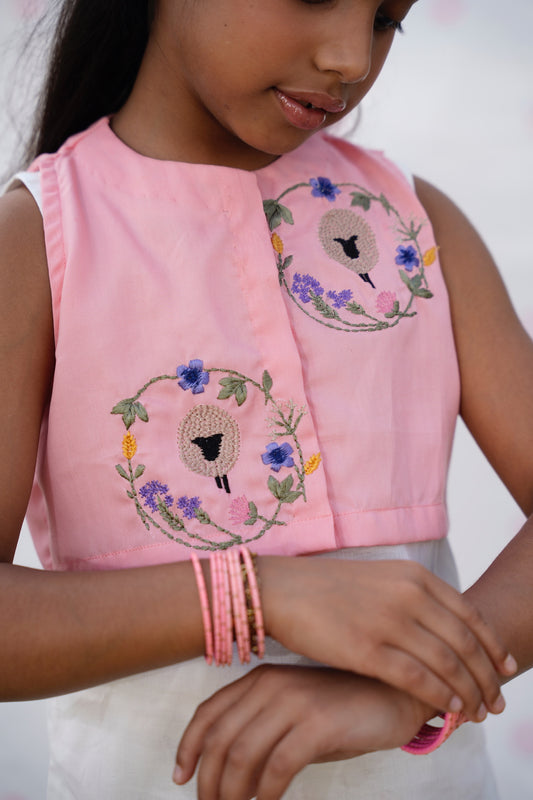 Full front, standing outdoors: "Blush pink embroidered cotton koti with floral chikankari gharara, full front view  SHAFAÉ Goatie Blush"