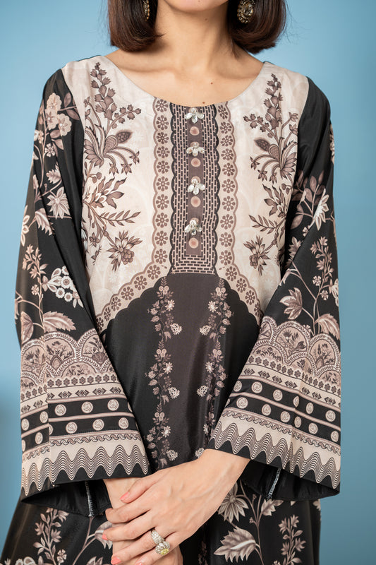 "Close-up of mother-of-pearl button placket on printed silk kurta  SHAFAÉ Midnight Kaftan"