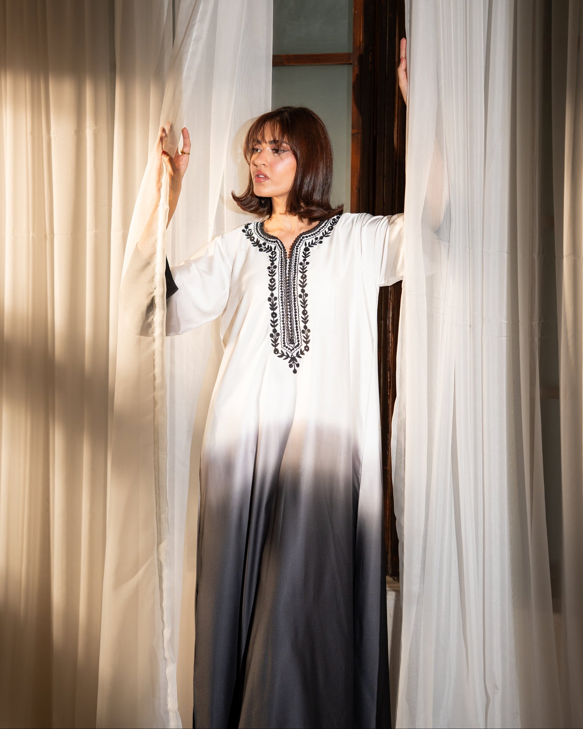  "Ivory to black ombré embroidered silk kaftan, full front view  SHAFAÉ Noir Ombre Kaftan"